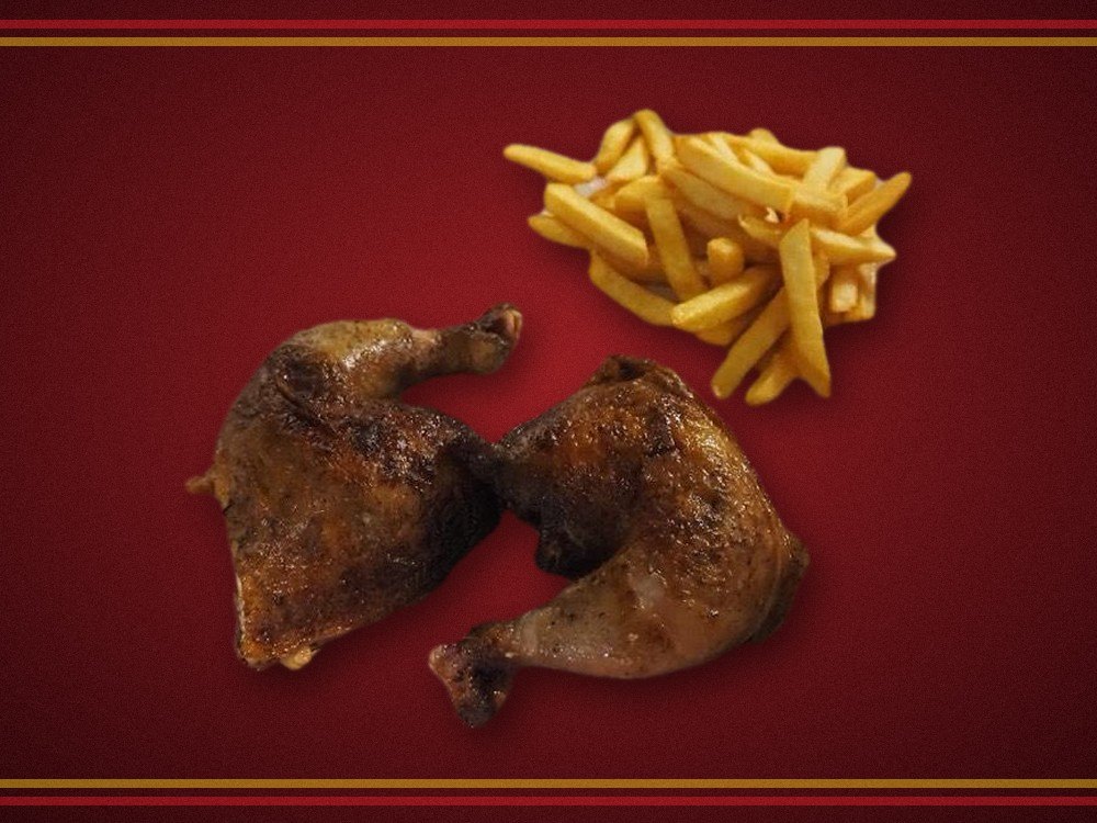 Medio pollo con papas fritas en Inka Brasas, Spring TX