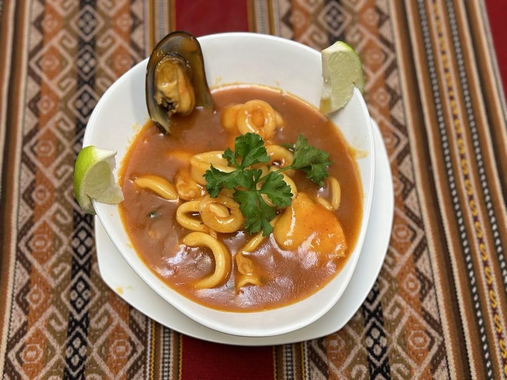 A seafood bowl from the kitchen, shown for the shrimp chowder